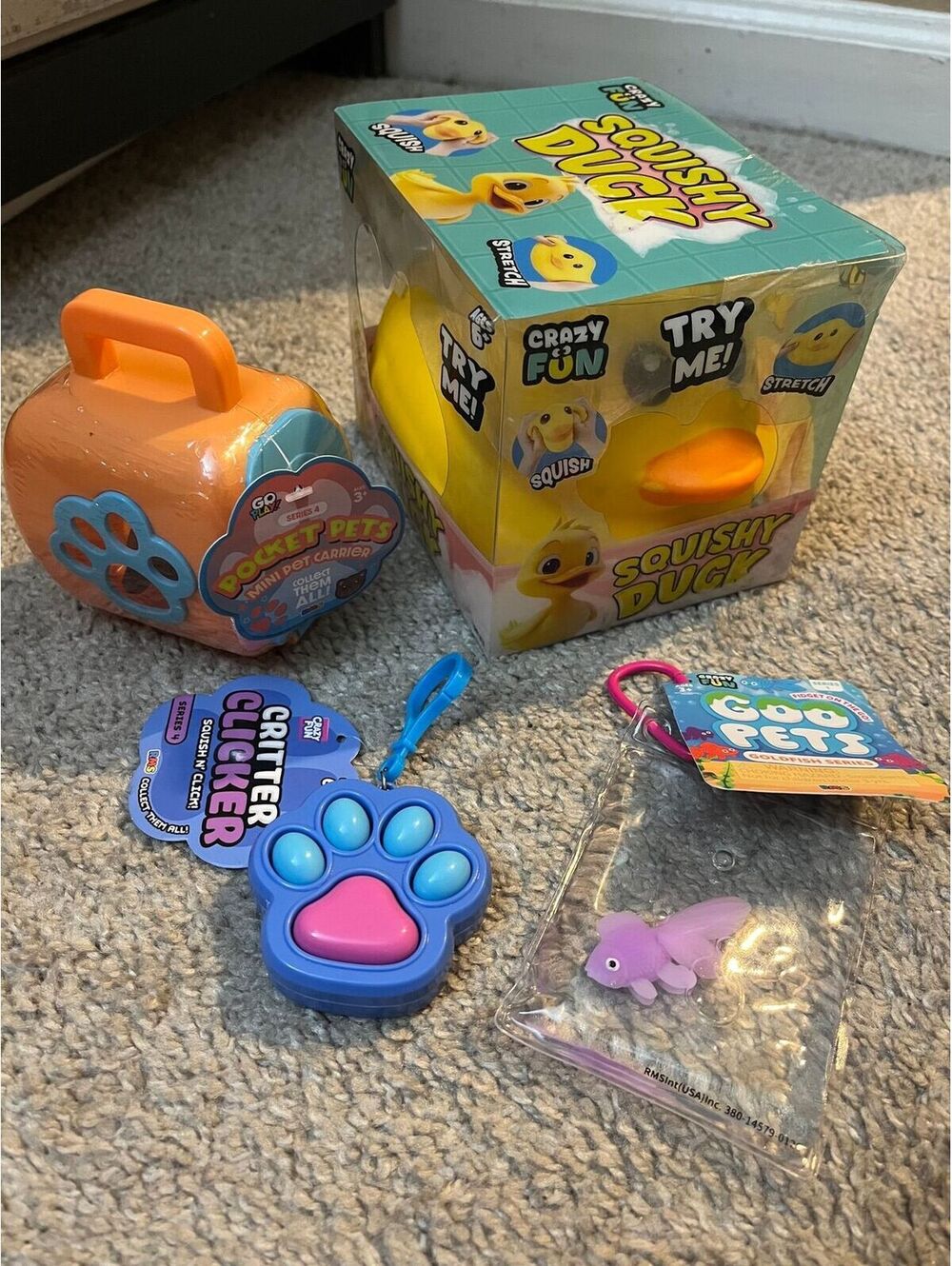 4 Piece Kids Bundle Squishy Duck Pocket Pets Critter Clicker Goo Pets Goldfish